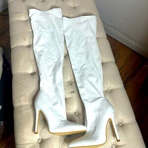 Tall sexy white faux snakeskin stiletto boots, shiny finish.